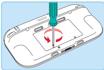 NINTENDO WII U PREMIUM - Retirez les vis du couvercle de la batterie - 1