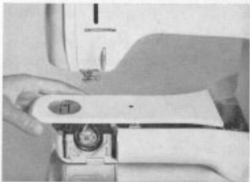 BERNINA 707 - To take off the open arm cover - 1