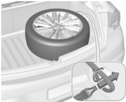 OPEL ASTRA 2016 - Rangement d'une roue de plein format endommagée dans le coffre - 1