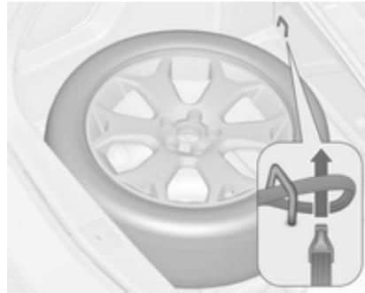 OPEL MERIVA B 2011 - Rangement d'une roue remplacée dans le coffre à l'aide d'une sangle - 1