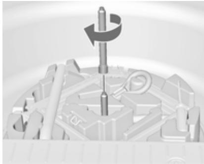 OPEL MERIVA B 2011 - Rangement d'une roue remplacée dans le coffre à l'aide d'une barre d'extension - 1