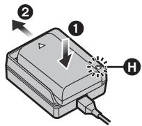 PANASONIC DMWBTC12GN - Attach the battery by paying attention to its direction, then slide the battery in until it is secure. - 1