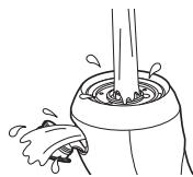 PANASONIC EHXC10 - Open the facial cleanser compartment cover, begin pouring water into the foam dispenser, and then press the facial cleansse switch to rinse. - 1