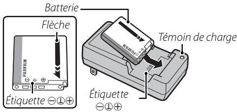 FUJI X20 - Insérez la batterie dans le chargeur de batterie fourni. - 1