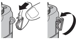 FUJI X20 - Insérez l'extrémité de l'attache dans l'un des oeillets. - 1
