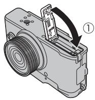 FUJI X20 - Fermez le couvercle du compartment de la batterie. - 1