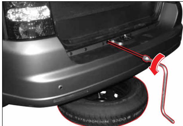 SSANGYONG REXTON 2 - DEPOSE DE LA ROUE DE SECOURS - 1
