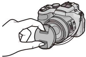 PANASONIC LUMIX FZ200 - Fixer le capuchon d'objectif. - 1