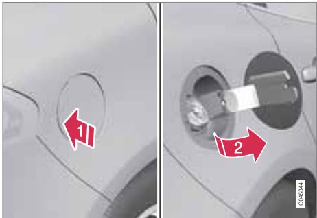 VOLVO V40 - Ouvrir/fermer la trappe du réservoir de carburant - 1