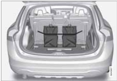 VOLVO V60 - Dispositif de retenue pour sacs à provisions* - 1