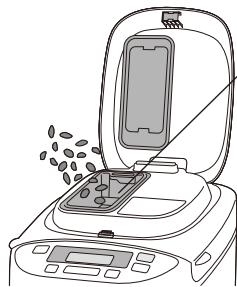 PANASONIC SD 2500 - Sortez le moule à pain et installez le bras pétrisseur - 4