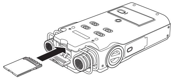 TASCAM DR-100 - Insérez une carte SD. - 1