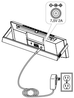 ALTEC LANSING IMT 620 - Cómo instalar un adaptor de CA - 1