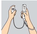 GAMES NINTENDO WII WII SPORTS - Holding the Wii Remote - 1