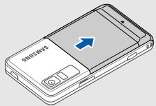 SAMSUNG PLAYER STYLE - Installation de la carte SIM ou USIM et de la batterie - 1