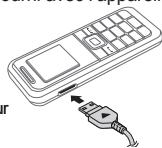 SAMSUNG E1120 - Metre la batterie en charge - 1