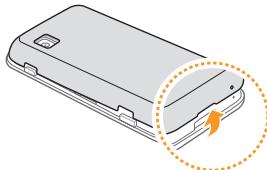 SAMSUNG WAVE 575 GT-S5750E - Installer la carte SIM/USIM et la batterie - 1