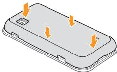 SAMSUNG WAVE 575 GT-S5750E - Installer la carte SIM/USIM et la batterie - 6