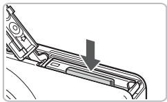CANON IXUS 95 IS - Retirez la batterie. - 1