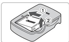 CANON IXUS 95 IS - Retirez la batterie. - 1