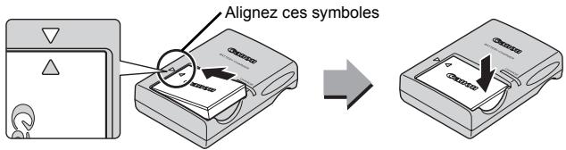 CANON DIGITAL IXUS 80 IS - Placez la batterie dans le chargeur de batterie. - 1