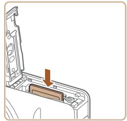 CANON POWERSHOT SX600 HS - Retrait de la batterie et de la carte mémoire - 2
