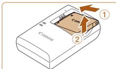 CANON IXUS 165 - Retirez la batterie. - 1