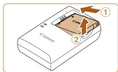 CANON IXUS 175 - Chargez la batterie. - 2