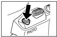 CANON MV850I - Appuyez à fond sur la touche PHOTO. - 1