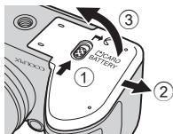NIKON COOLPIX L330 - Ouvrez le volet du logement pour accumulator/ carte mémoire. - 1