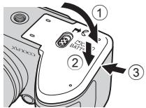 NIKON COOLPIX L330 - Refermez le volet du logement pour accumulator/carte mémoire. - 1