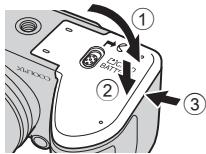 NIKON COOLPIX L330 - Refermez le volet du logement pour accumulator/ carte mémoire. - 1