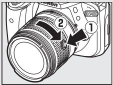 NIKON D3400 - Rétracter les objectifs dotés d'une « commande de déverrouillage de l'objet rétractable - 1