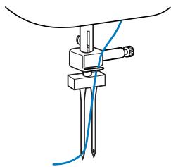 BROTHER FS100WT - Manually thread the left needle with the upper thread. - 1