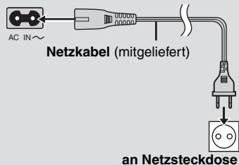 AC IN~ Netzkabel (mitgeliefert) an Netzsteckdose