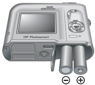 HP PHOTOSMART M527 - Installation des piles - 2