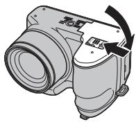 FUJIFILM S2980 - Fermez le couvercle du compartment des piles. - 1