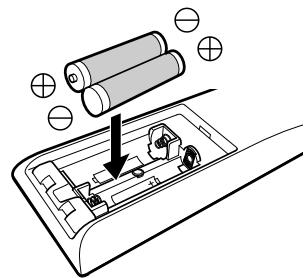 JVC DLA-X700R - Carga de las pilas en el control remoto - 2