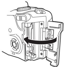 OLYMPUS E-500 - Retirer la carte. - 3