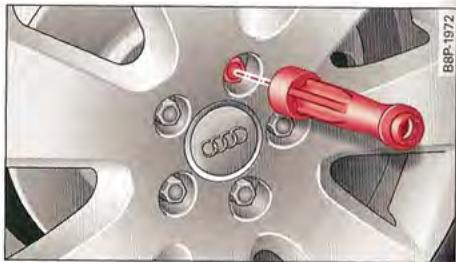 AUDI A1 2010 - Boulons de roue avec capuchons de protection - 1