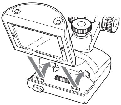 SONY NV-U50 - Align the 2 slots on the underside of the unit with the tabs on the cradle, then push to snap the unit into place. - 1