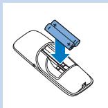 PHILIPS PR3098/00 - Insertion des piles dans la télécommande - 2