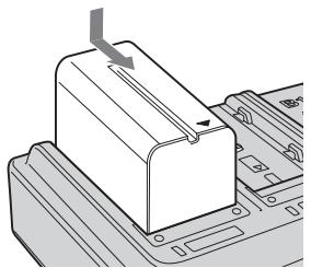 SONY AC-VQL1BP - Retrait de la batterie - 1