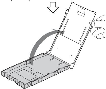 SONY DPP-FP95 - Ouvrez le couvercle du magasin à papier. - 2