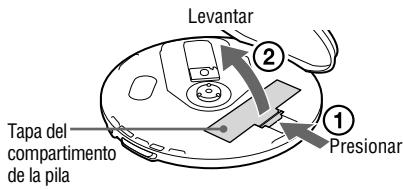 Levantar 2 Tapa del compartimento de la pila 1 Presionar