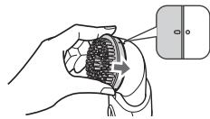 Diagram showing a hand holding a device with a close-up of its screen, labeled in Chinese.