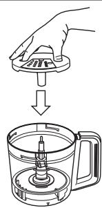 Diagram showing a hand pressing down on a device into a watermelon cup, illustrating the process of cleaning or cleaning.