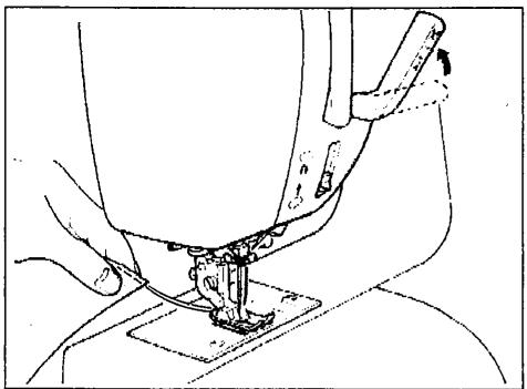 SINGER SYMPHONIE 500 - Retirez le tissu de la machine. - 1