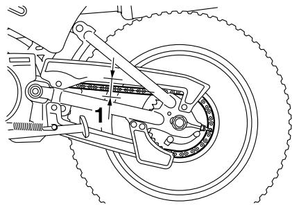 YAMAHA PW80 - Contrôle de la tension de la chaîne de transmission - 1