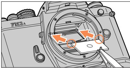 NIKON FM3A - Mettez la plage de remplacement sur le support de plage. - 1